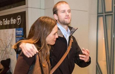 Matthew Trevithick left Logan International Airport Sunday evening with his mother, Amelia Newcomb, after being freed from an Iranian prison. 
